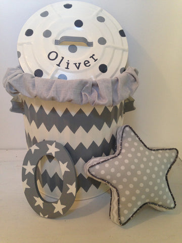 Hamper, pillow, and wall letter.